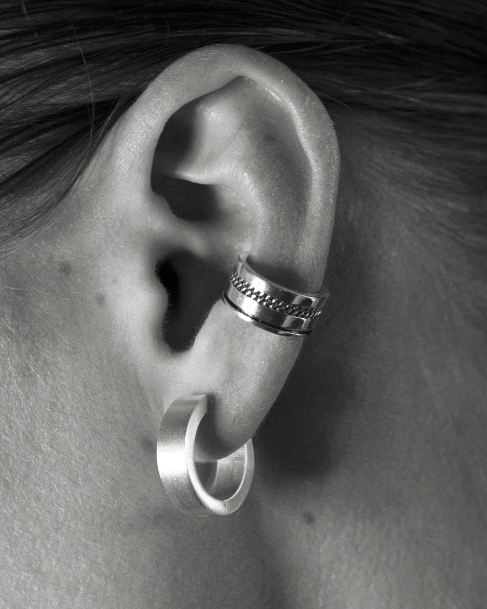 silver hoop brushed close up ear monochrome
