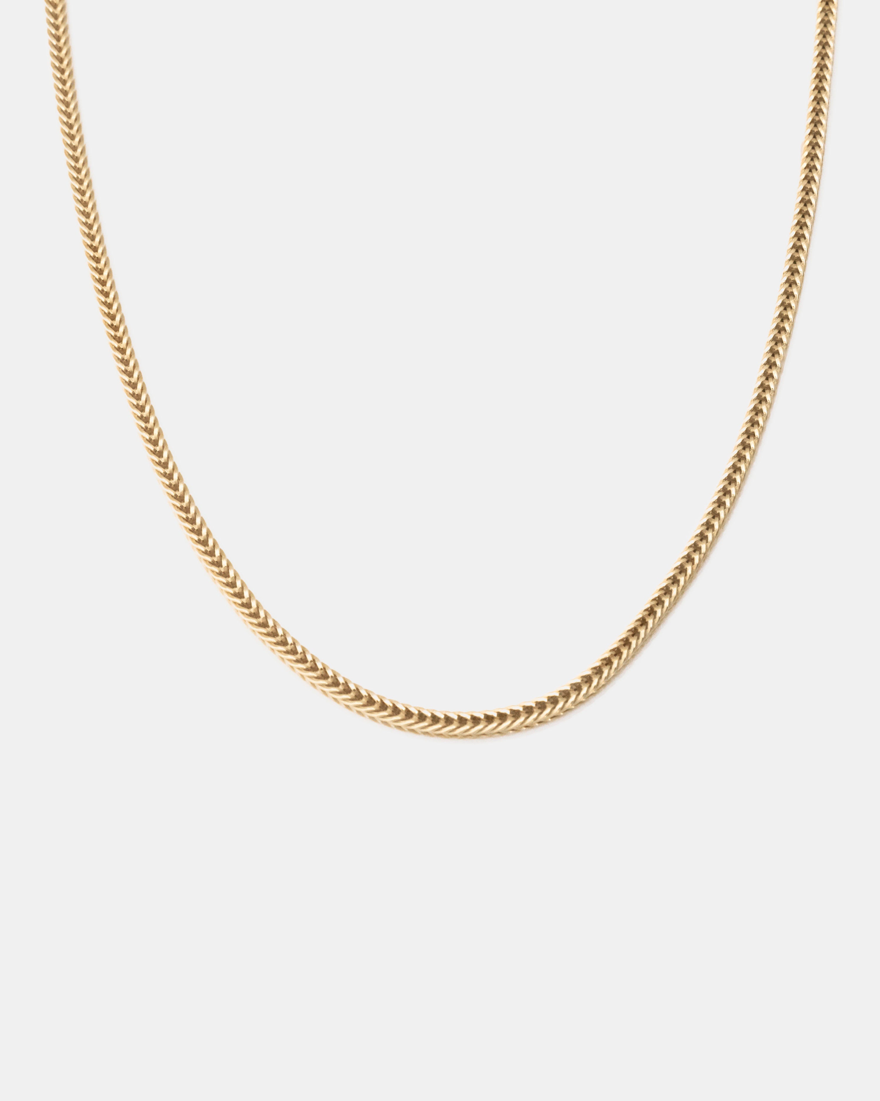gold plated fox chain necklace with a polished finish, displayed on a plain white background by studio sette